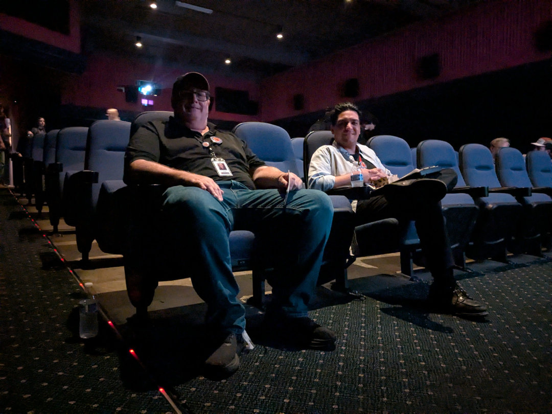Eric and Colin Sitting down in front row