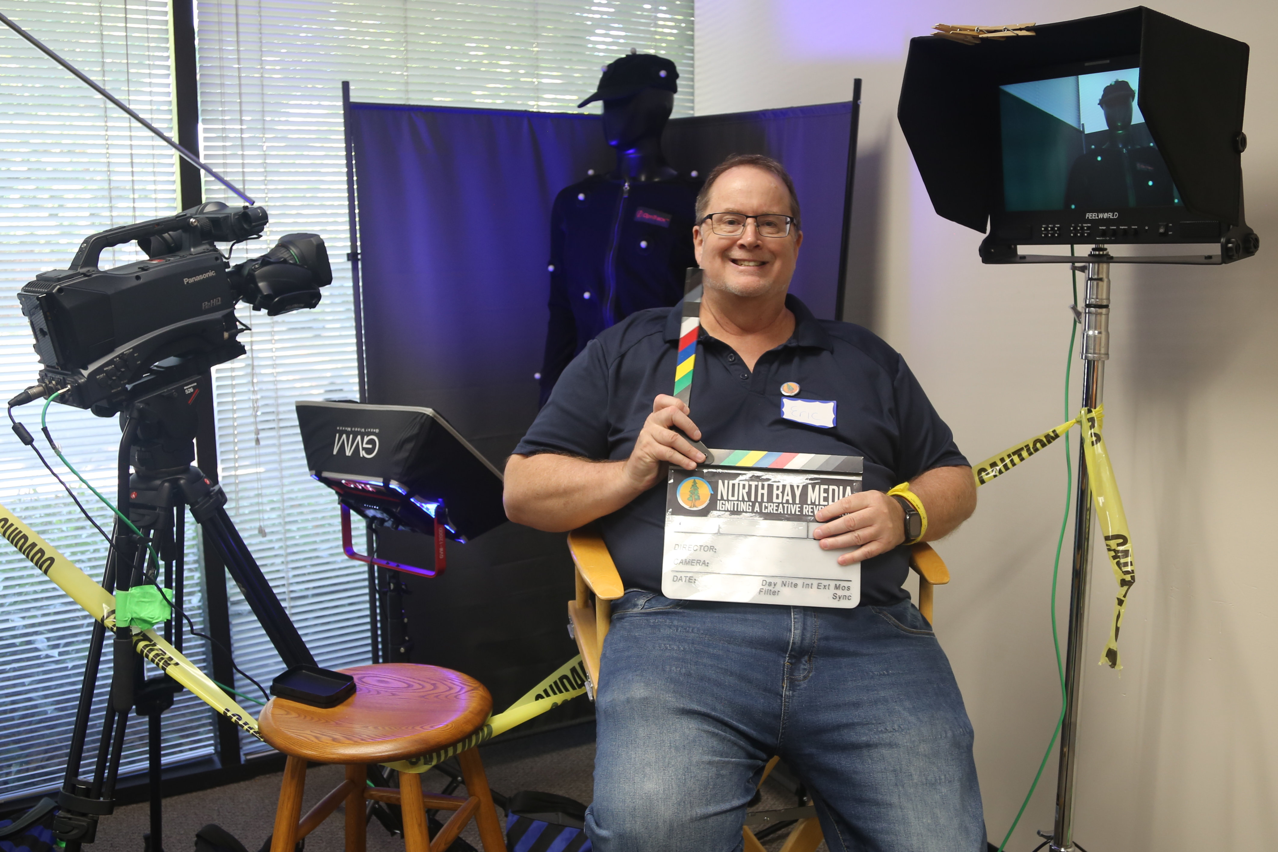 Man in Directors chair