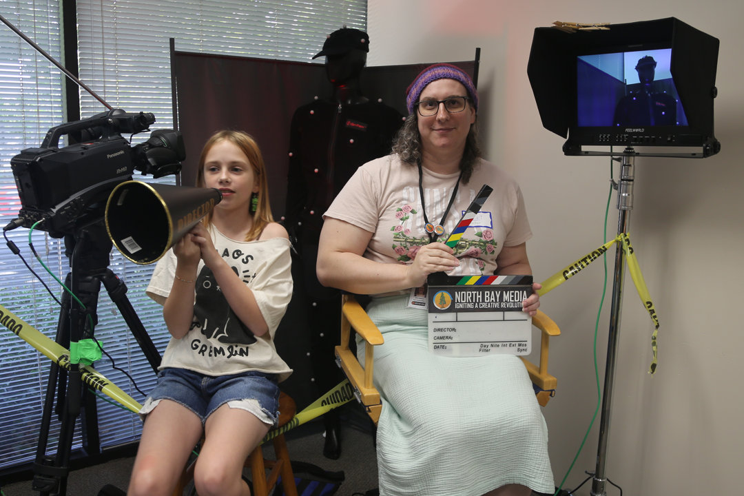 Man in Directors chair